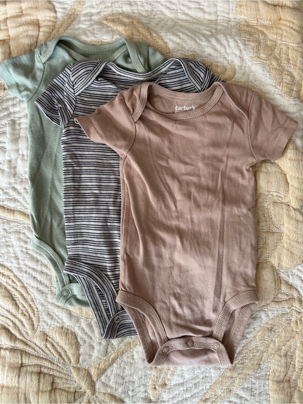 three pastel onesies bundle